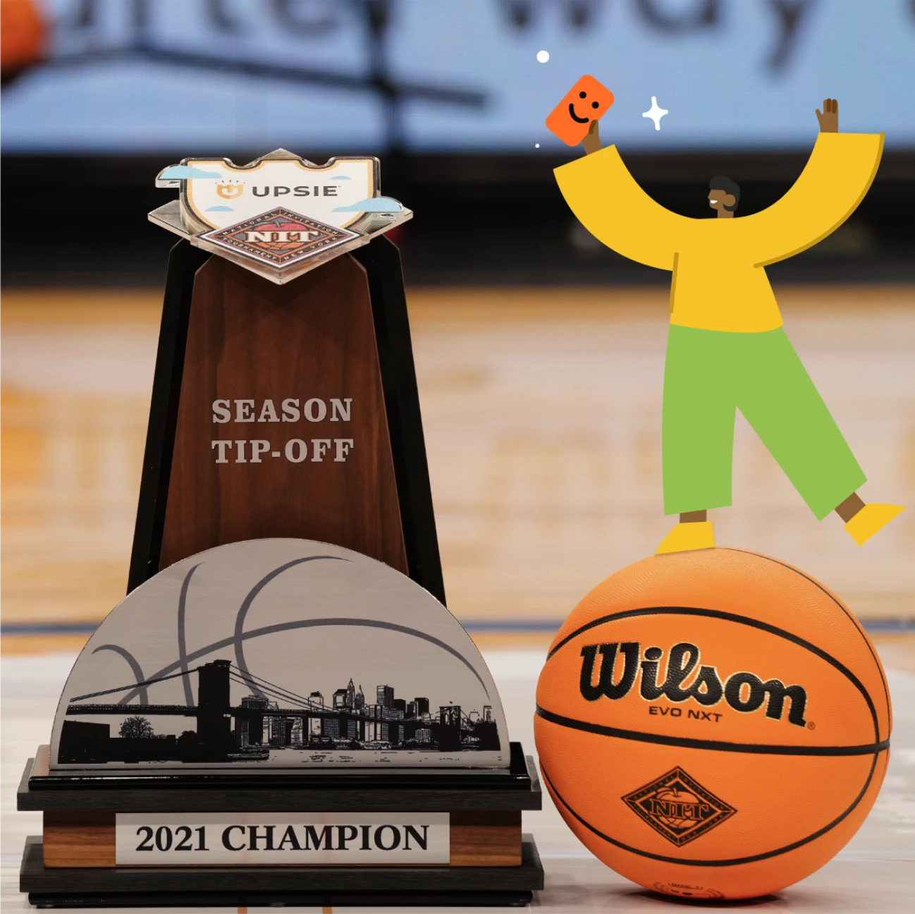 Basketball tropy, featuring the Upsie logo.