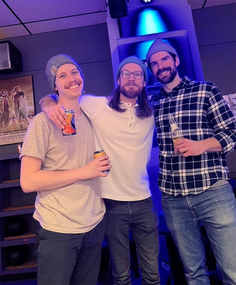 Nate, Chris, and Adam smiling for the camera.