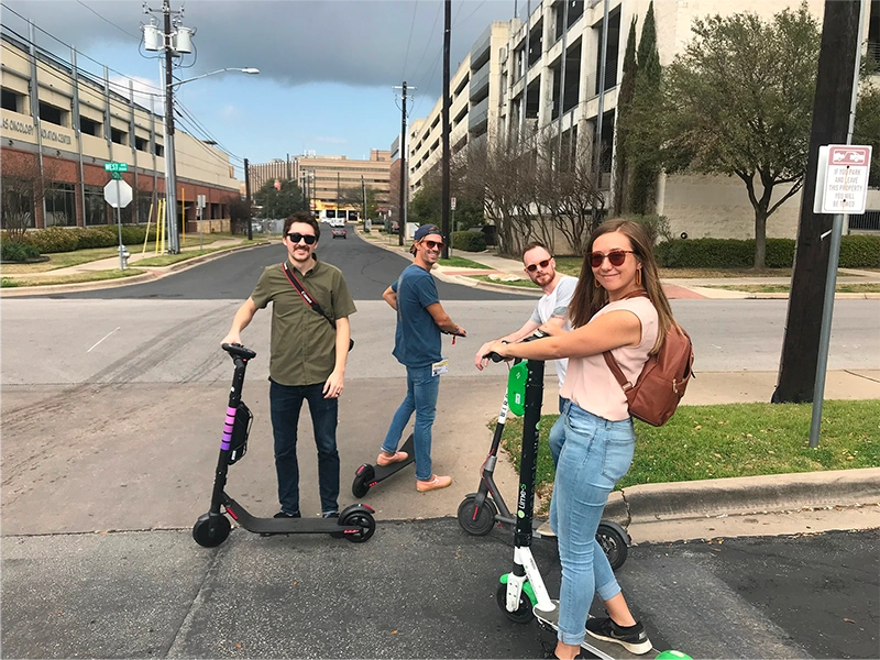 Ocupop scooter gang smiling and looking tough.