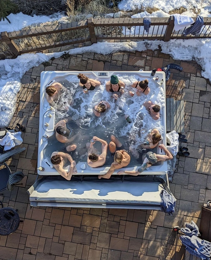 That's a big hot tub! The crew soaks it up in a giant hot tub in Colorado