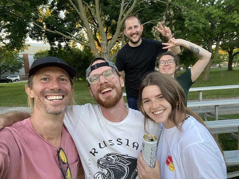 Michael, Chris, Jess, Maggie, and Alex having a park hang