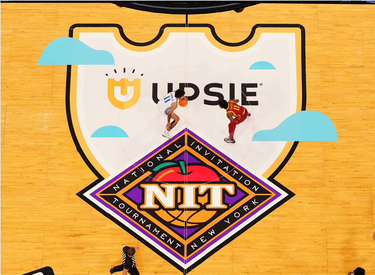 Overhead shot of basketball court with Upsie logo